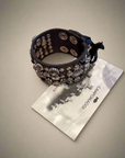 Bracelet. Leather+ stud+ flowers rhinestones.Color: Grey. X2876 C0501
