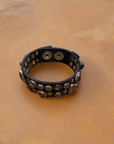 Bracelet. Leather+ stud+ red triangular rhinestones. Color: Grey. X2867 C0501.